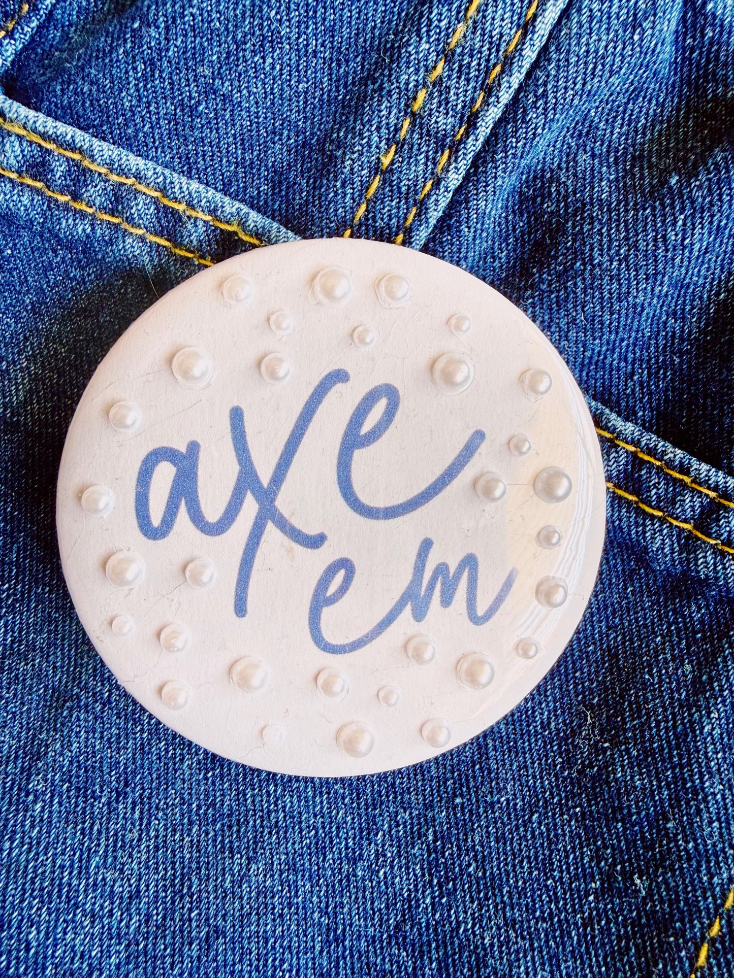 Axe Em Button
