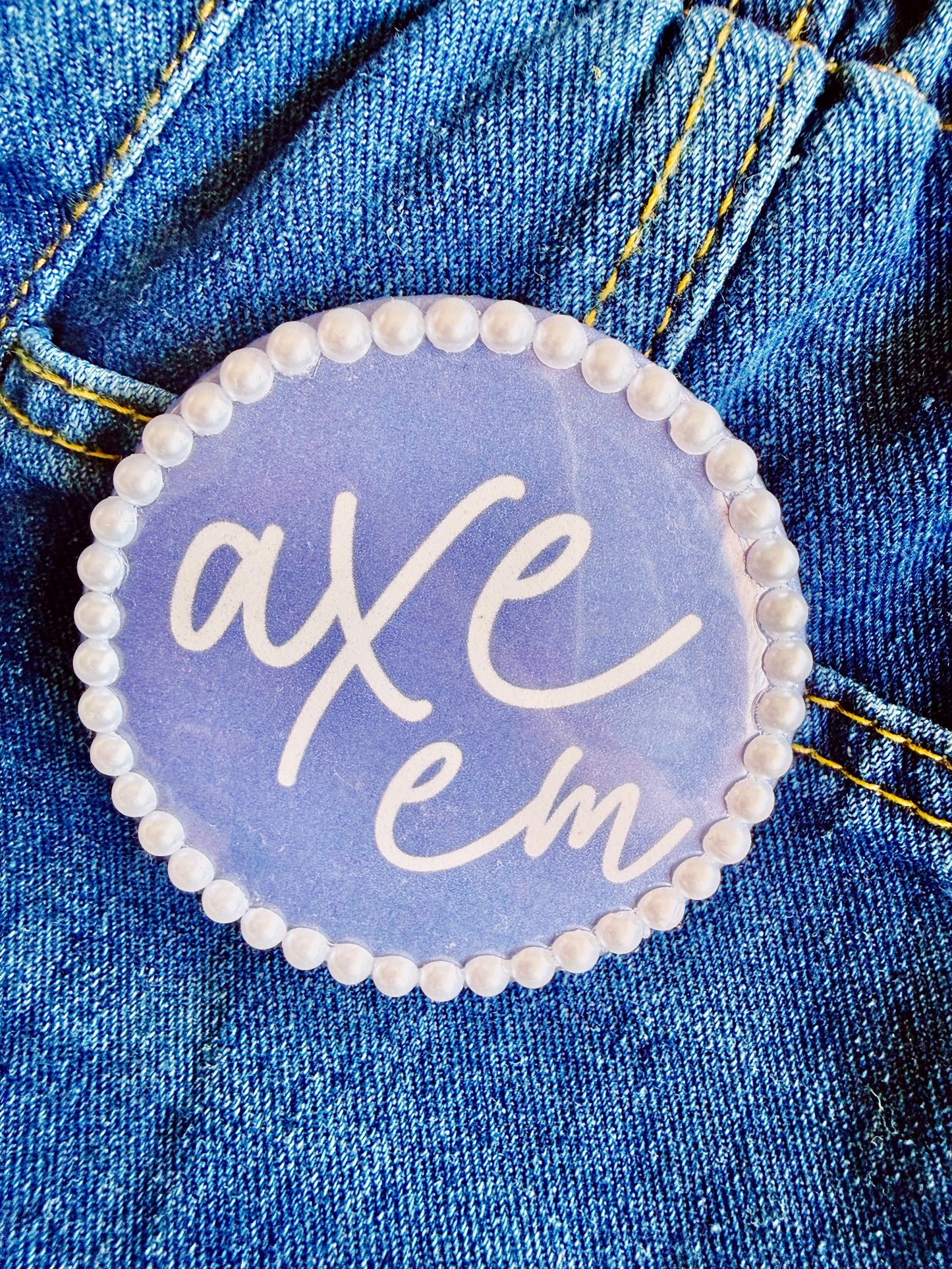 Axe Em Button